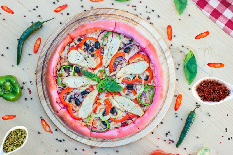 Veggie Supreme pizza with colorful fresh vegetables