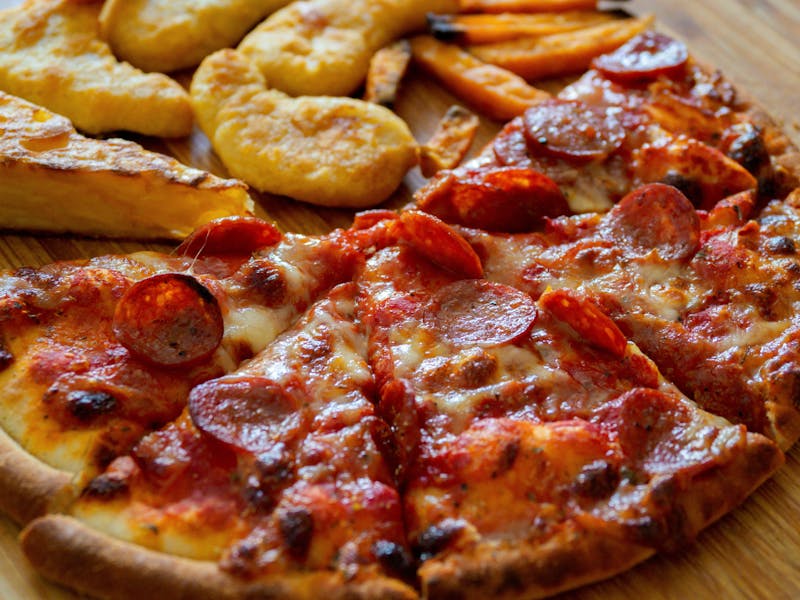Meat Lovers ranch pizza loaded with pepperoni and sausage